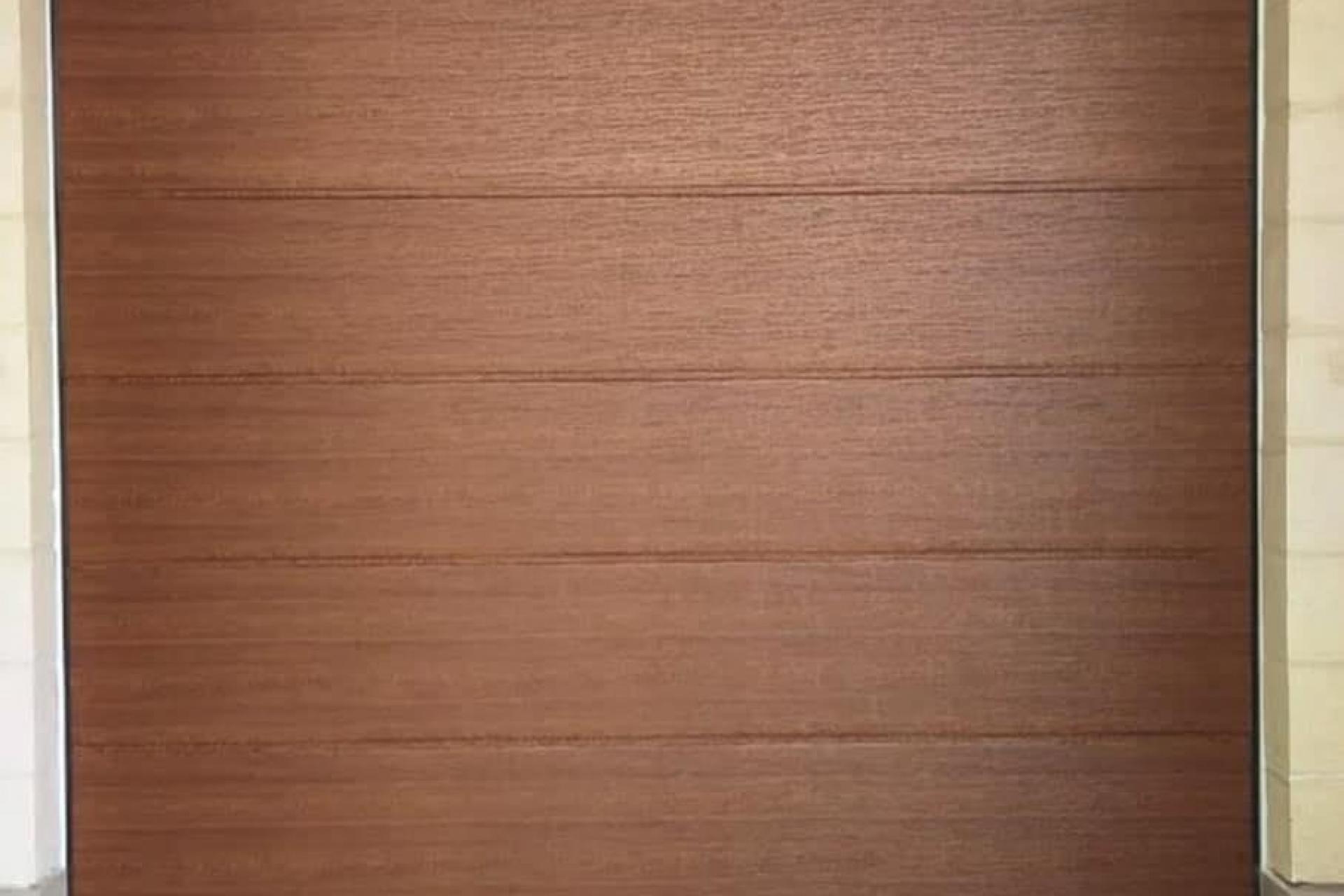 reddish wood colour, garage doors Malta