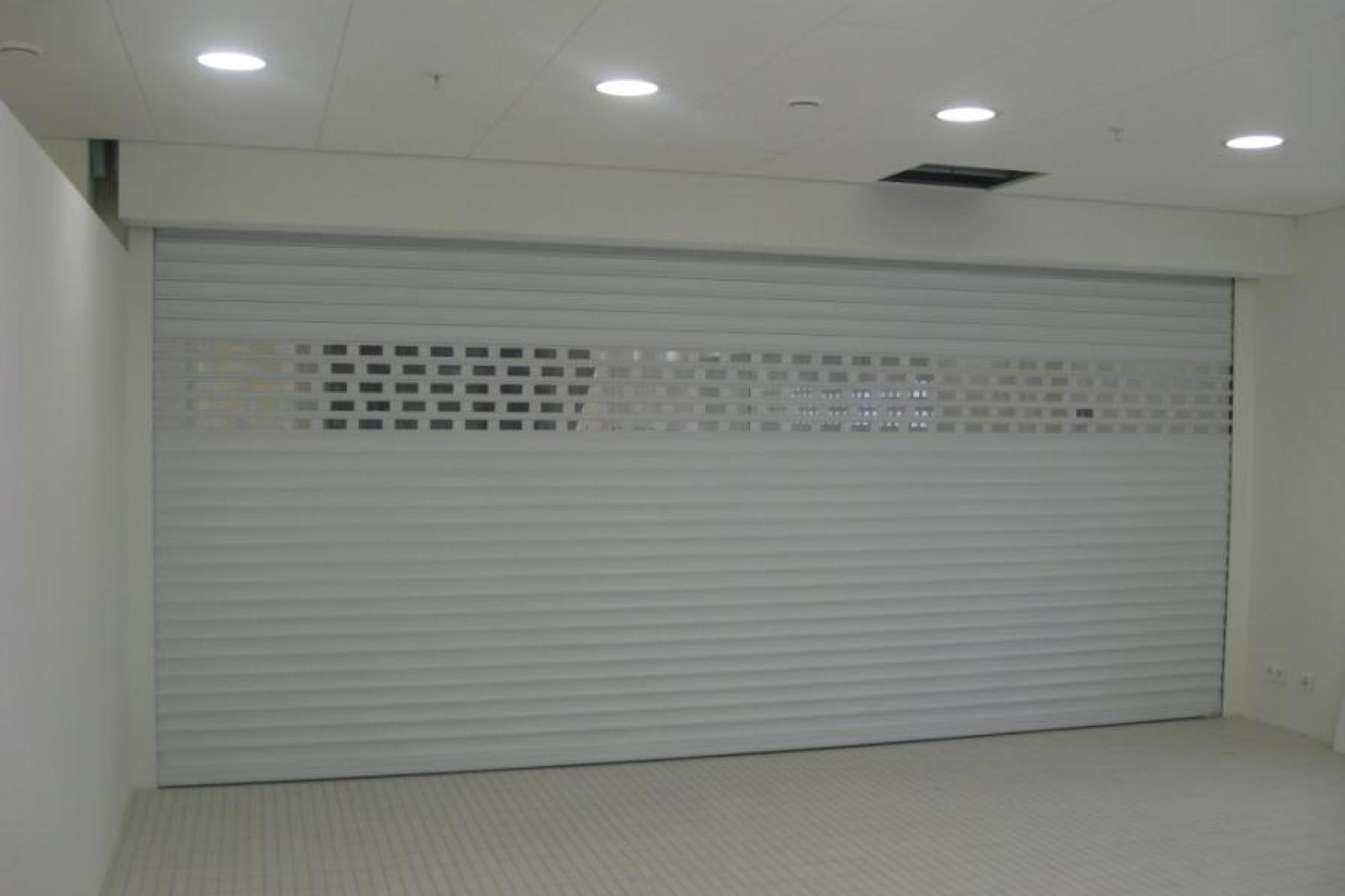 White Perforated roller shutter