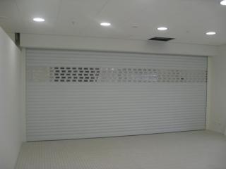 White Perforated roller shutter